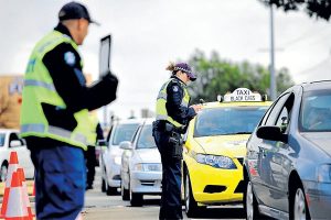 Roadblocks bring seven arrests during police crackdown