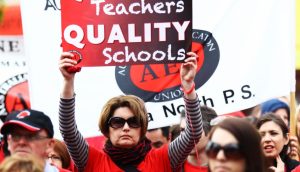 Teachers rally outside Finn office and vow to fight on