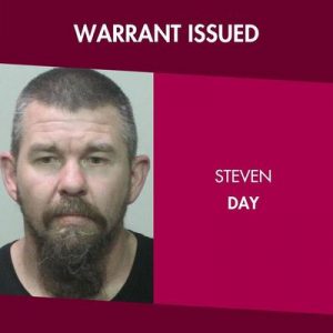 Day wanted on warrant