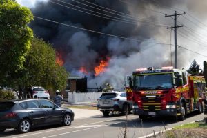 “Acrid” fire fills the air