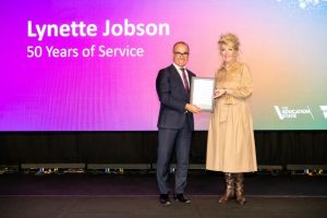 Principal honoured for 50 years of service