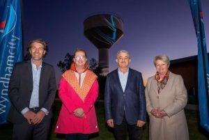 Water tower illuminated by light display
