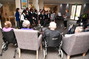 Pupils perform for new pals