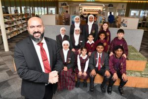 Islamic College of Melbourne students selling books to buy books.