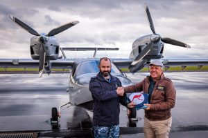 Adventurer touches down