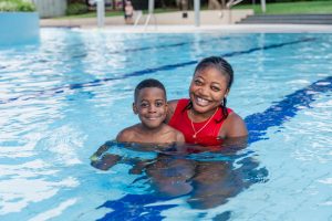 Swimmers cool off at outdoor pool