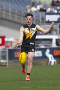 Grintell, Tulio re-signs