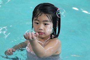 Learning to swim with rainbows and bubbles